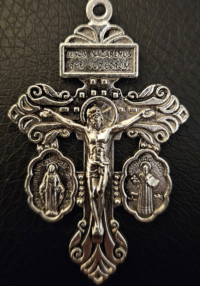 Cruz del Perdón en Metal